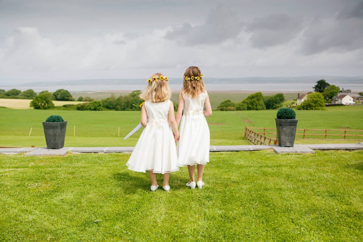 Bridesmaids looking out to sea at Ocean View Gower Wedding Venue