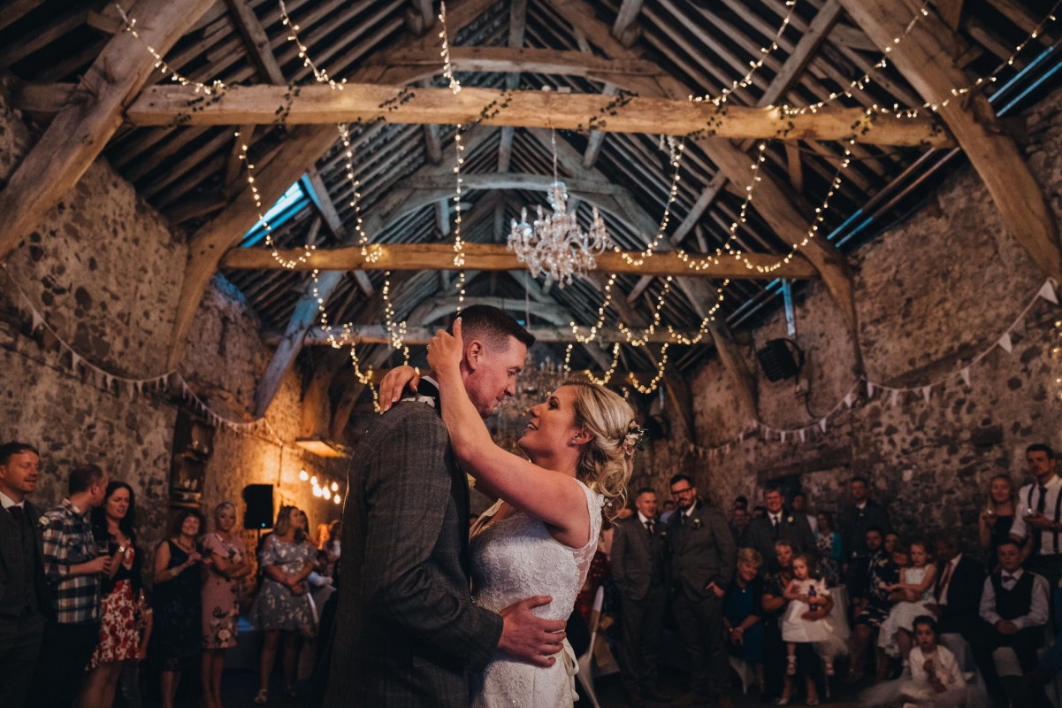 Couple on Their Wedding Day In Barn Wedding Venue